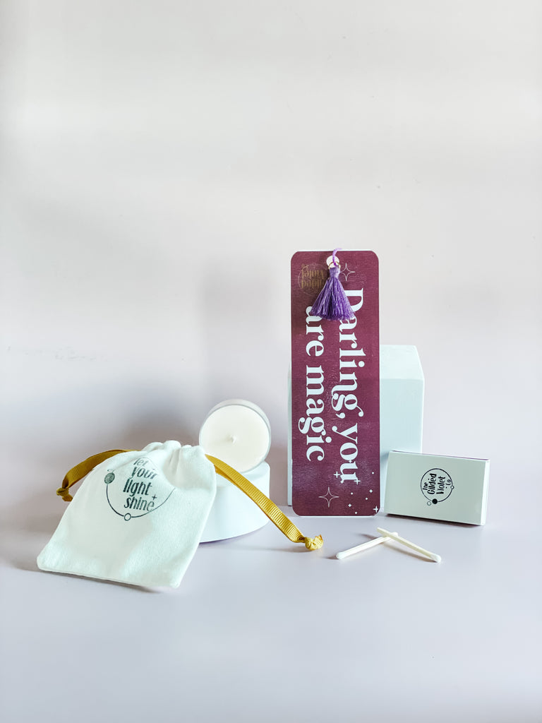 free tealight, bookmark, bag, and matches with purchase